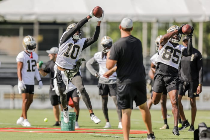 New Orleans Saints receivers Tre'Quan Smith (10) and Kirk Merritt (85) work on receiver drills during training camp. Mandatory Credit: Stephen Lew-USA TODAY